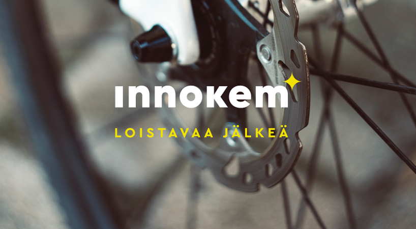 Polkupyörän takarengas ja Innokemin logo.